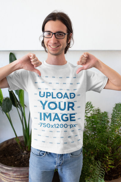 Mockup of a Happy Customer with Glasses Pointing His Own T-Shirt 