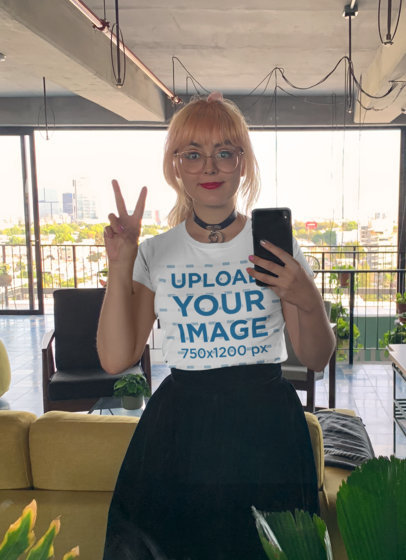 Tee Mockup Featuring a Woman Making a Peace Sign