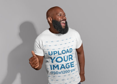 T-Shirt Mockup of a Man with a Big Beard Dancing