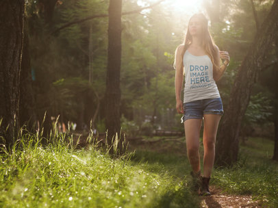 Tank Top Mockup Template of a Woman Hiking in the Woods
