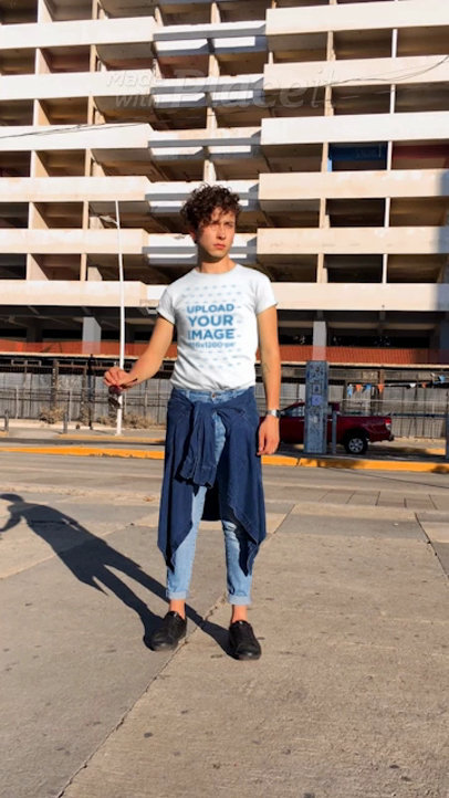 T-Shirt Video Maker Featuring a Hipster Man Wearing a Tee in a City