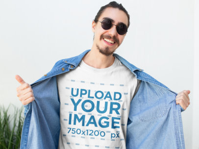 Tee Mockup Featuring a Happy Customer Revealing His T-Shirt