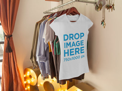 T-Shirt Mockup of a T-Shirt Hanging From a Rack at a Store