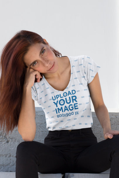 Mockup of a Woman with Freckles Wearing a V-Neck Sublimated Tee