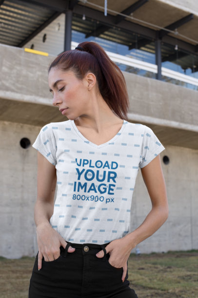V-Neck T-Shirt Mockup of a Woman with Her Hands Inside Her Pockets