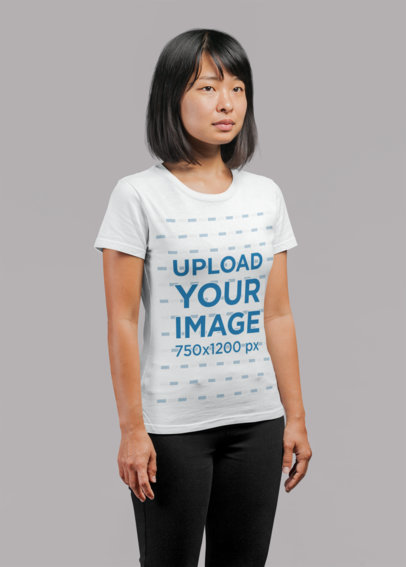 Round-Neck Tee Mockup Featuring a Short-Haired Woman in a Studio