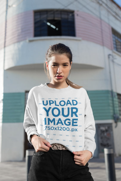 Mockup of a Girl Wearing a Baggy Sweatshirt on the Street 25792