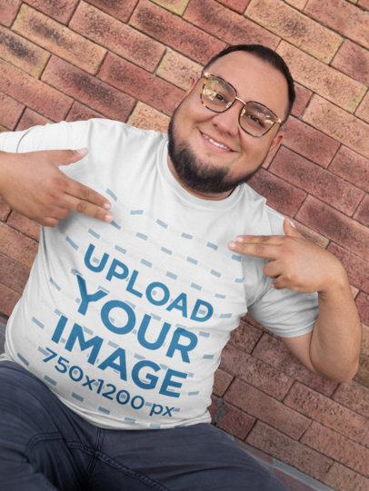 Mockup of a Happy Customer with a Beard Pointing at His Own T-Shirt