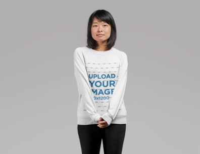 Crewneck Sweatshirt Mockup of a Girl with Bob Haircut Holding Her Own Hands 21737