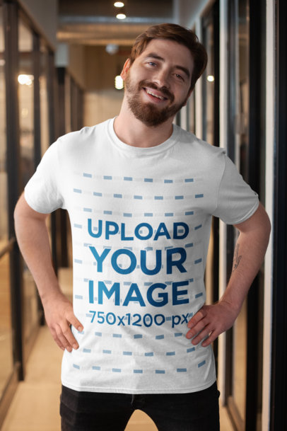 T-Shirt Mockup Featuring a Happy Customer in an Elegant Corridor 