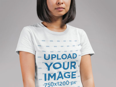 Tee Mockup of a Woman with Bob Haircut Standing at a Studio 21728
