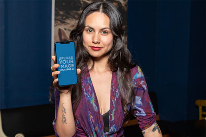 iPhone 11 Pro Max Mockup Featuring an Edgy Woman with Tattoos