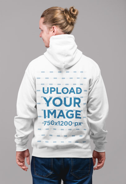 Back Full-Zip Hoodie Mockup of a Blonde Man with a Hair Bun Standing Inside a Studio