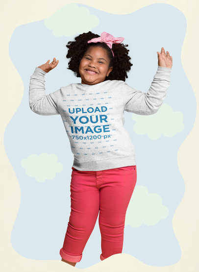Mockup of a Happy Afro-Haired Girl Wearing a Sweatshirt Surrounded by Paper Clouds
