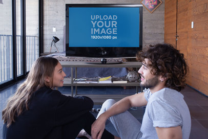 Mockup of a Man and a Woman Chatting in Front of the TV