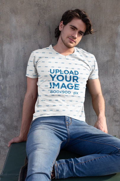 All Over T Shirt Mockup of a Handsome Man against a Concrete Wall 24988