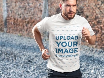 Fitness T-Shirt Mockup Featuring an Athletic Handsome Man Jogging 