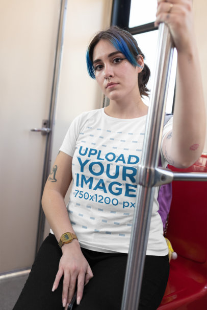 Plus Size T-Shirt Mockup of a Tattooed Girl with Blue Bangs Riding a Train 25471