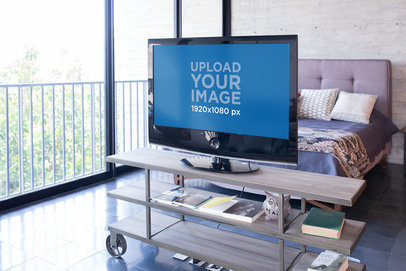 Smart Tv Mockup Featuring a Minimalist Bedroom with a Balcony