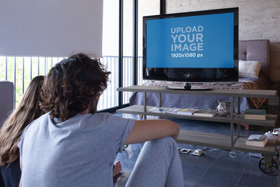 TV Mockup of Two Friends Sitting on the Floor 
