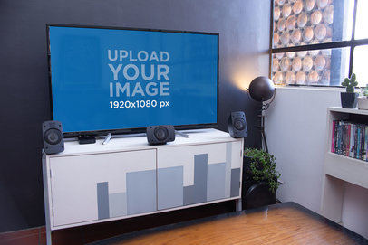 Mockup of a Flat Screen Smart TV with a Sound System