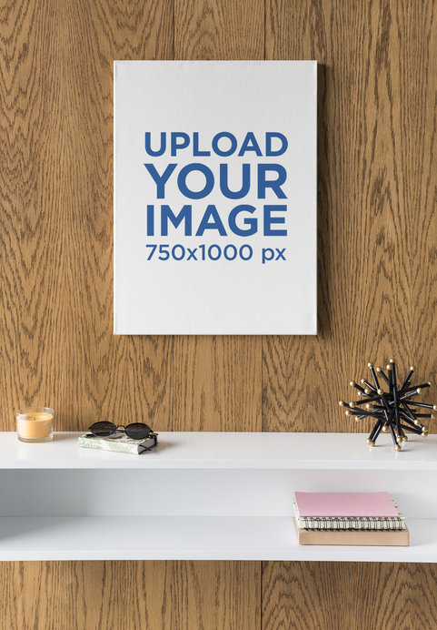 Vertical Canvas Print Mockup Hanging in a Room with Minimalist Furniture 
