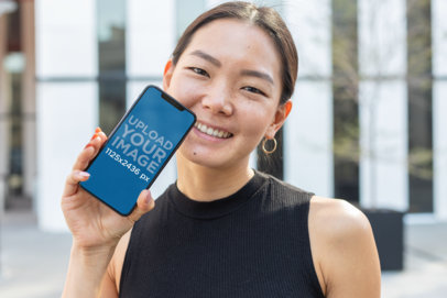 iPhone XS Mockup Featuring a Smiling Pretty Girl 25764