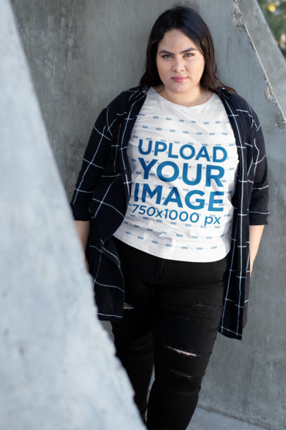 Plus Size T-Shirt Mockup of a Woman with Pretty Eyes in an Urban Scenario