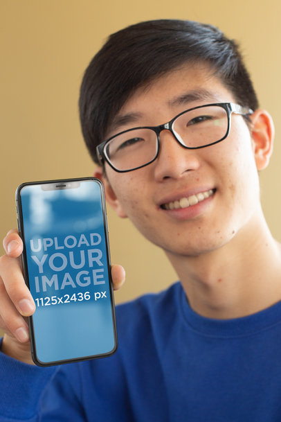 iPhone 11 Pro Mockup of a Smiling Man with Glasses 