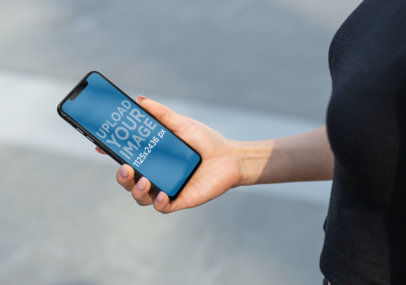 iPhone XS Mockup Featuring a Sporty Girl Checking Her Screen 25765