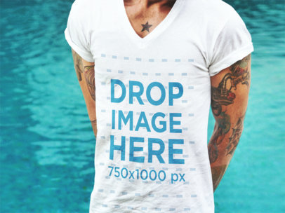 T-Shirt Mockup of a Bearded Man With Tattoos