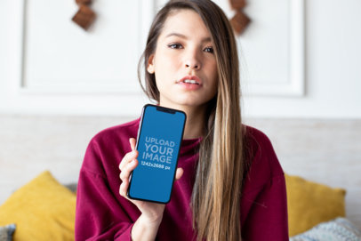 Mockup Featuring a Cute Blonde Woman Showing off Her iPhone 11 Pro Max