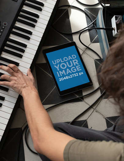 iPad Mockup of a Man Playing a Keyboard 25749