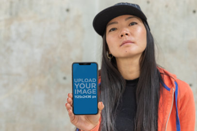 iPhone XS Mockup Featuring a Girl with Swag 25773