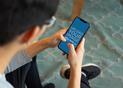 iPhone 11 Pro Mockup Featuring a Coworking Space