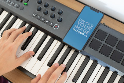 iPhone 11 Pro Max Mockup over a Piano Keyboard