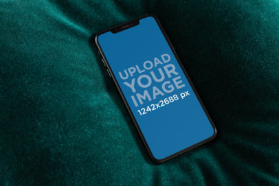 iPhone 11 Pro Max Mockup Lying over a Dark Blanket