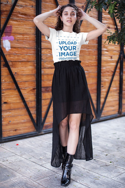 Mockup of a Fashionable Woman With Curly Hair Wearing a T-Shirt