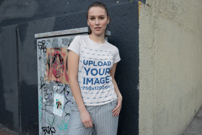 Tee Mockup of a Girl Posing by a Graffitied Electrical Enclosure 26271