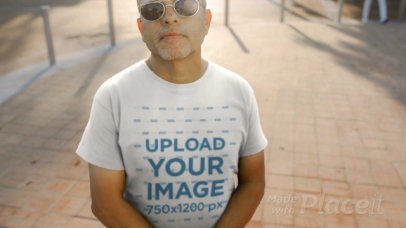 Tee Video Maker of a Cool Older Man Wearing a T-Shirt at Sunset