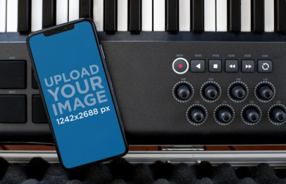 iPhone 11 Pro Max Mockup Lying over a Musical Keyboard