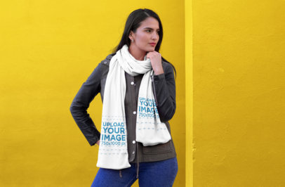 Scarf Mockup Featuring a Long-Haired Girl Posing by a Colorful Wall 25657