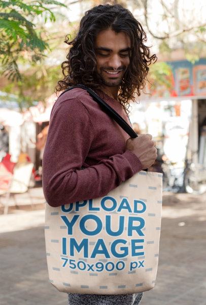 Mockup Featuring a Man With Long Trendy Hair Carrying a Tote Bag