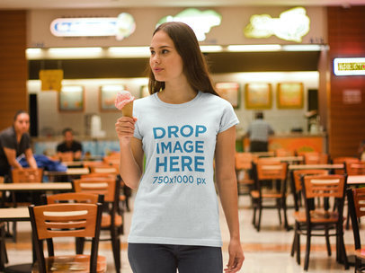 T-Shirt Mockup of a Woman Enjoying an Ice Cream