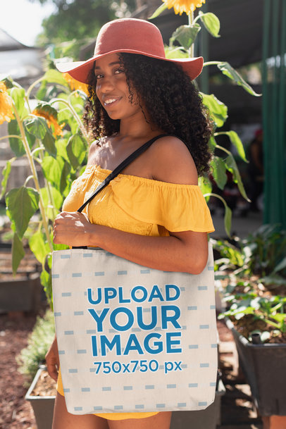 Tote Bag Mockup of a Woman with a Floppy Hat 