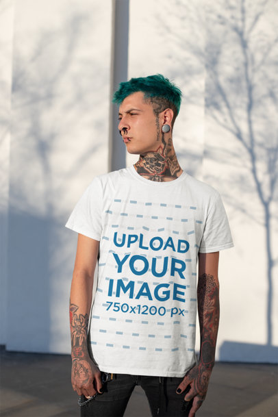 T-Shirt Mockup of a Pierced Man with Tattoos Looking Away 26478