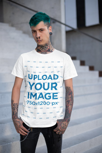 T-Shirt Mockup of an Alternative Green-Haired Man Posing in a Stairway 