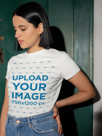 Tee Mockup of a Cute Short-Haired Woman Holding Her Back Hip