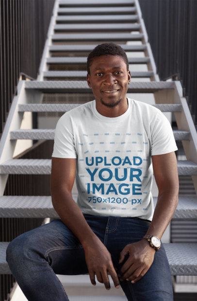 T-Shirt Mockup of a Man Sitting on a Stairway