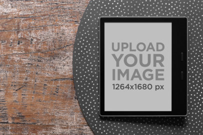 Kindle Oasis Mockup over a Table Mat